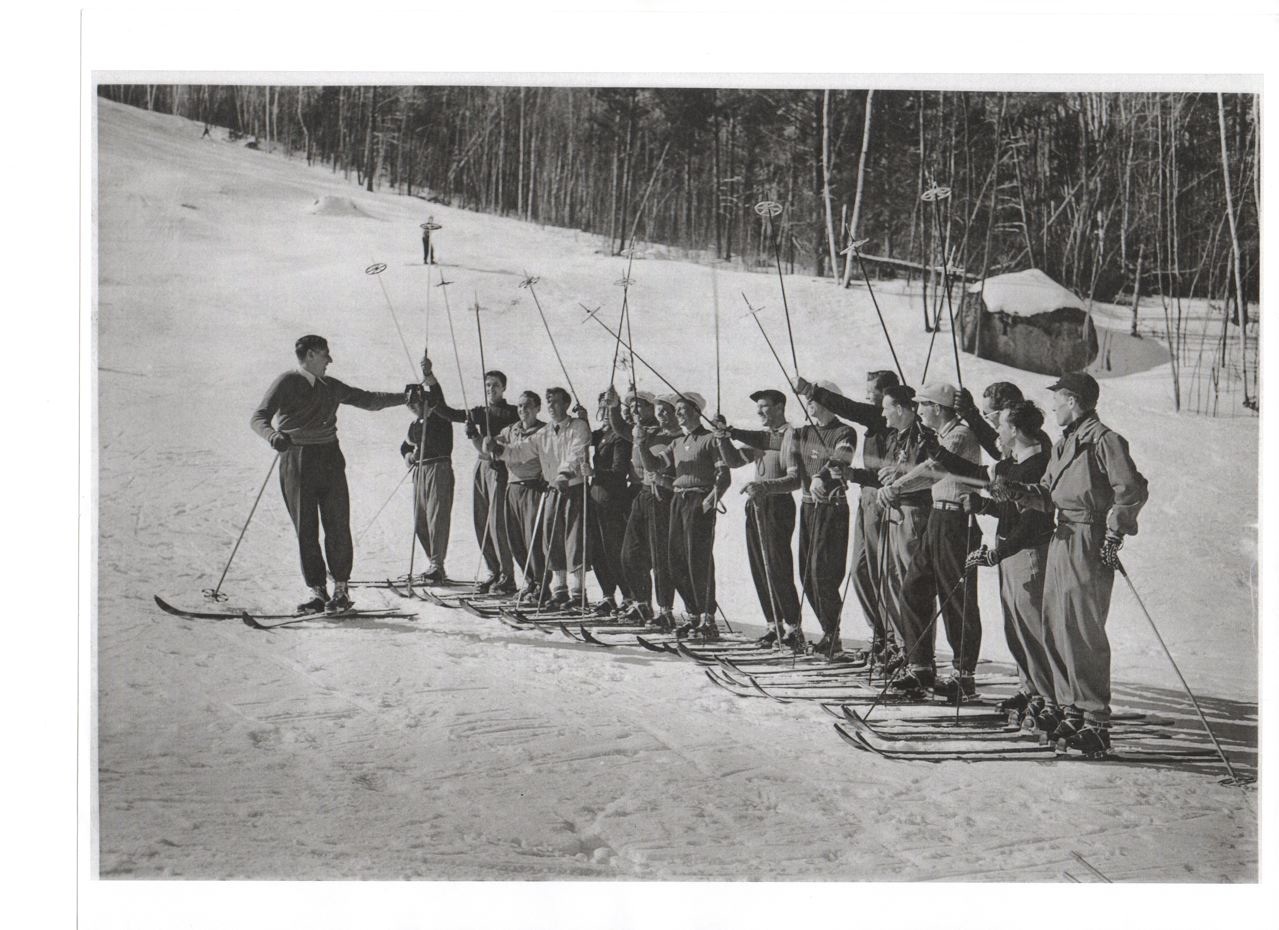 Black and White image of skier instruction