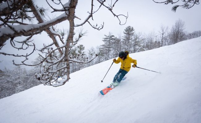 skier yellow jacket