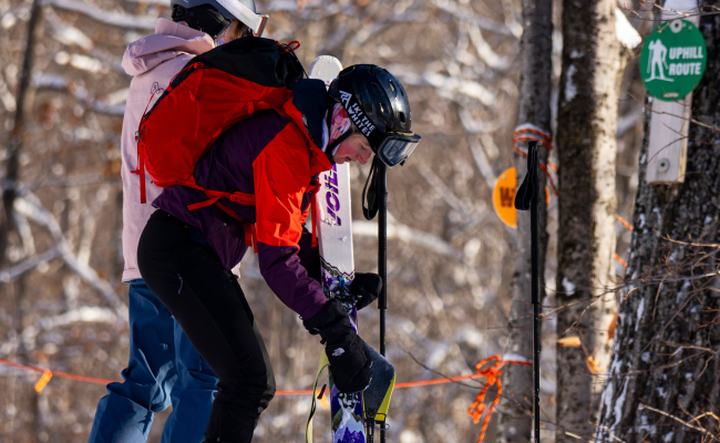 Skier removing skins