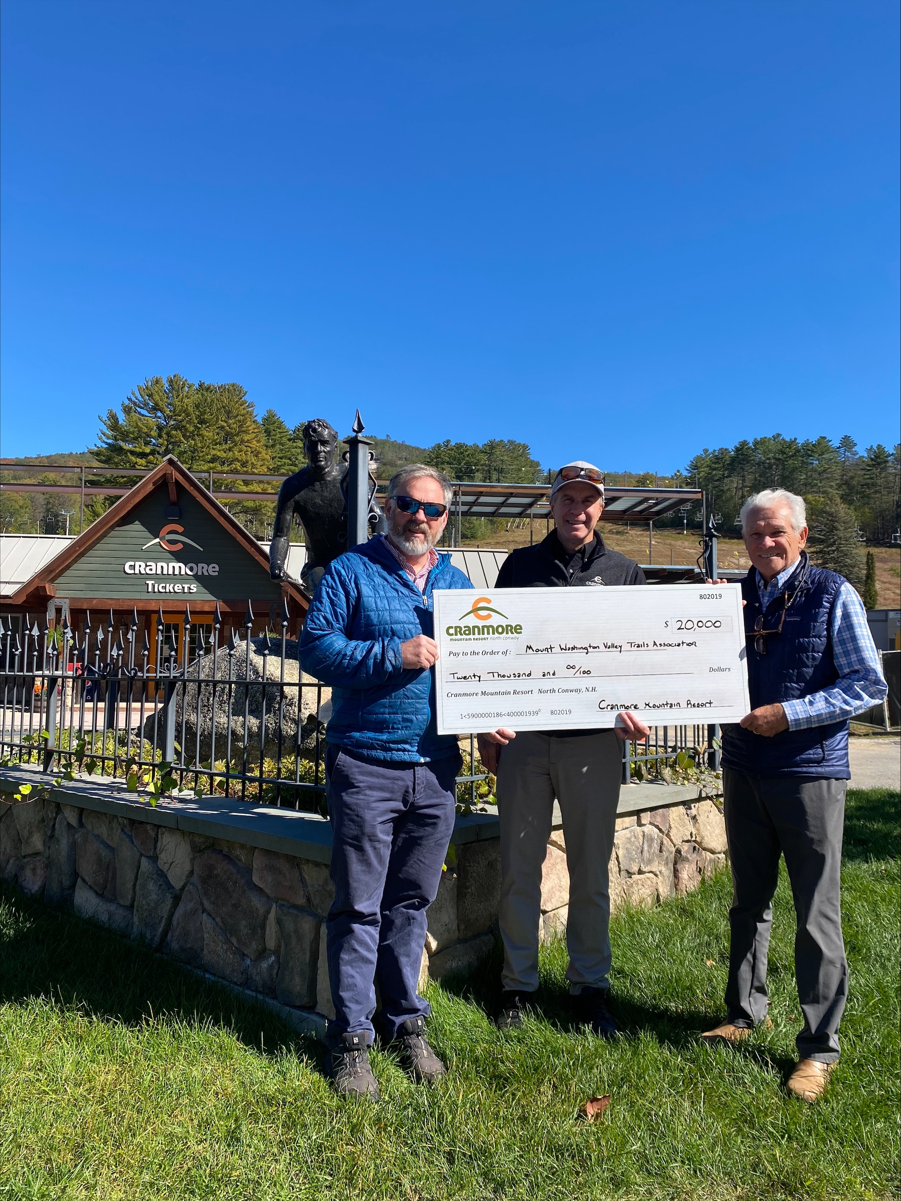 Ben Wilcox presents check to MWV Trails Association