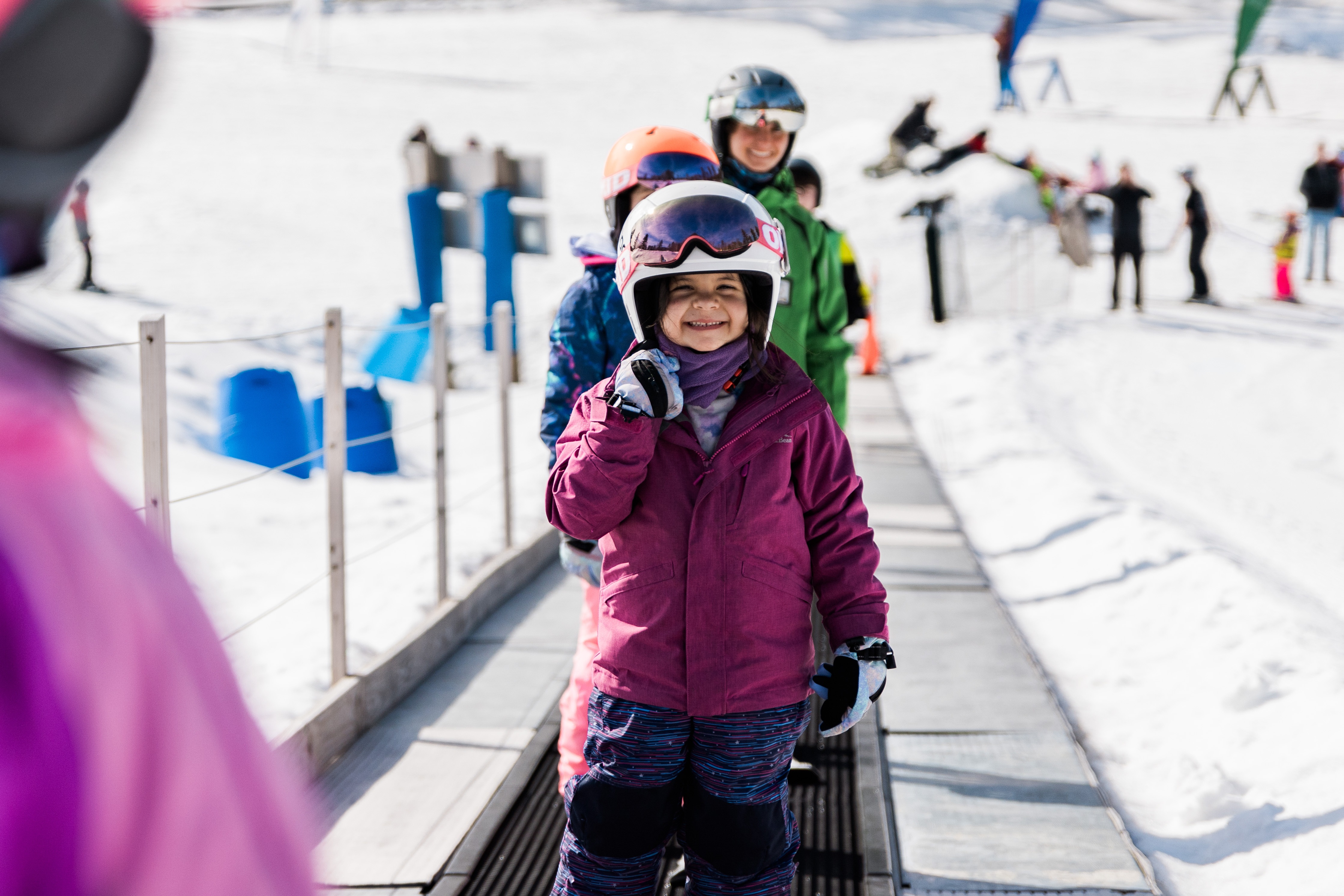 kids going up magic carpet