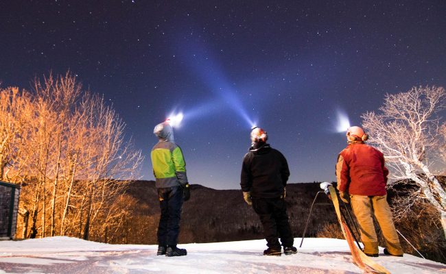 snowmakers at night